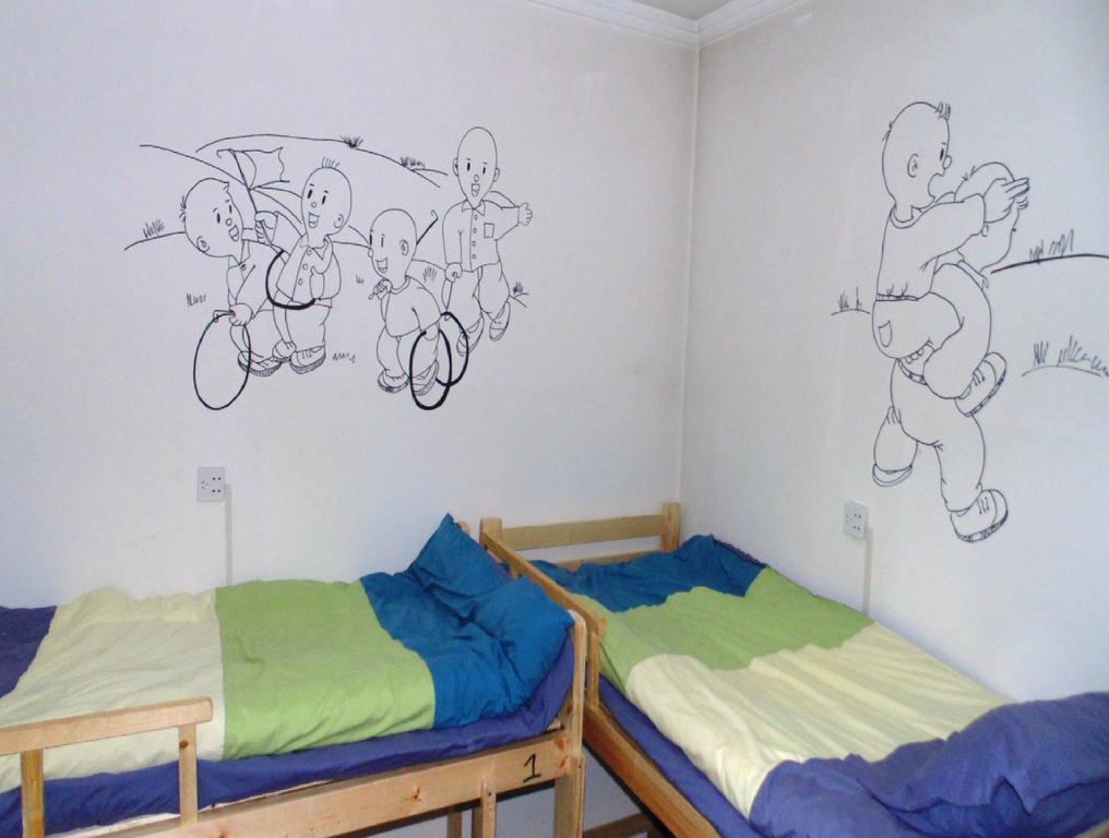Hua Qiu Ku Youth Hostel East Street Branch Xi'an  Camera foto